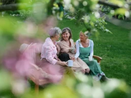 Mutligenerational friends sitting together